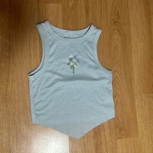Blue tank top with flowers in the front